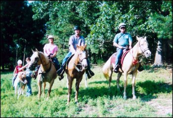 A Family enjoys a trail ride.....Priscilla, Don, Will, & Daisy.